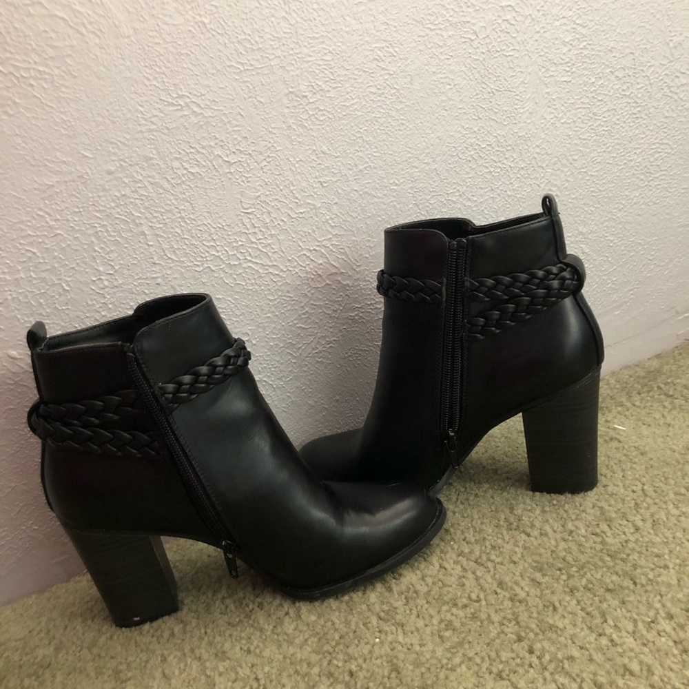 Black leather high heel boots
